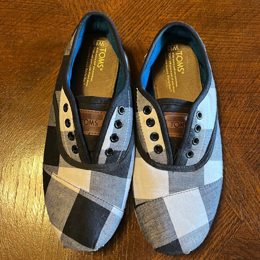 Black and white checkered Toms shoes